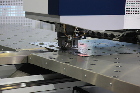 Finished metal parts inspected and packed for delivery